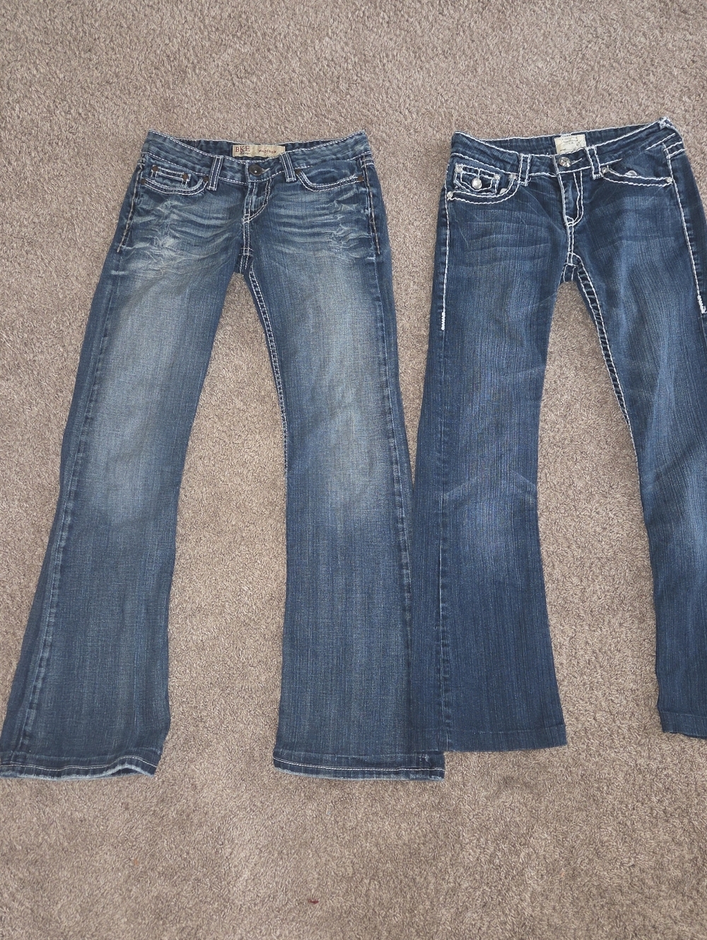 2 pairs of women's size 5/26 bootcut ieansBoth are in good condition